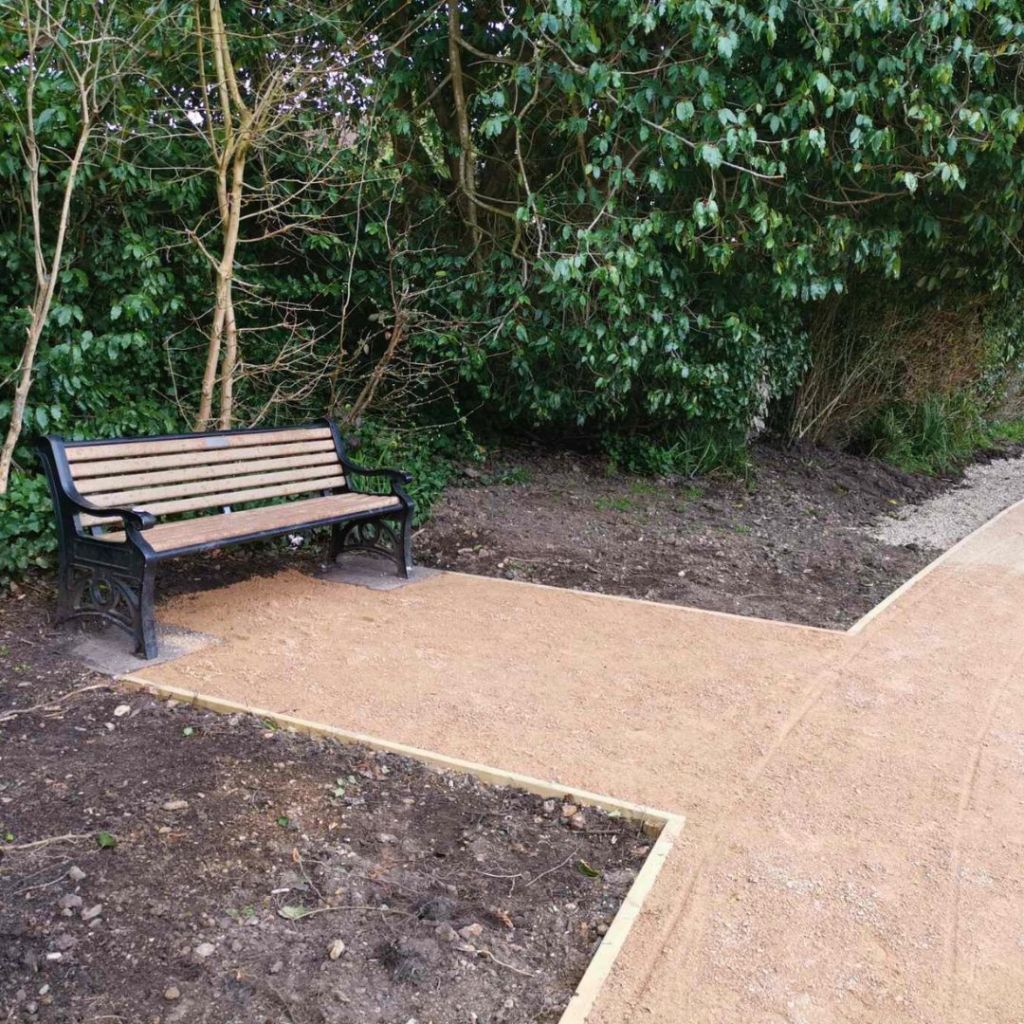 Updated bench area on North side of the pond